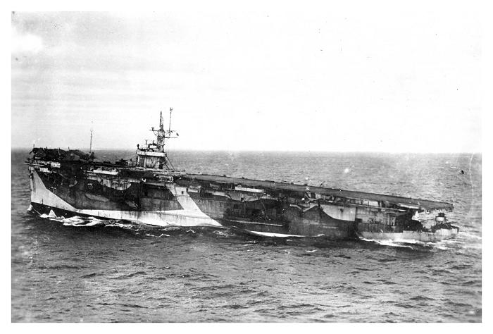 Lotus Terminals - HMS Nabob listing on its side 1944